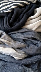 Soft, textured fabrics in shades of gray and black.  Perfect for textile design inspiration.