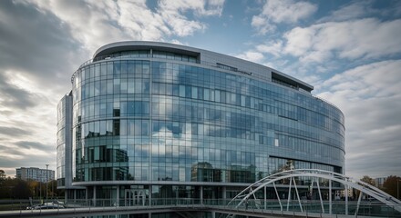 Fototapeta premium Modern glass office building with city.