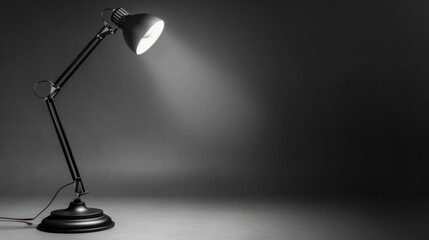Desk Lamp Illuminating a Dark Space Minimalist Lighting Design for Workspaces and Study Areas