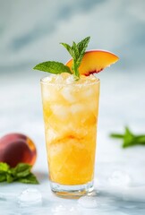 Fototapeta premium Refreshing Summer Cocktail with Peach Slice and Mint Garnish in a Tall Glass on a Light Background for Beverage and Mixology Photography