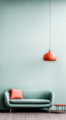 Modern minimalist living room featuring teal sofa and orange pendant light