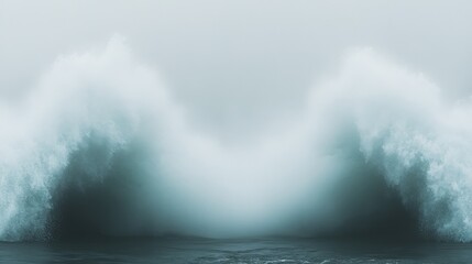 Dramatic ocean waves crashing, creating a powerful V-shape splash. Abstract nature photography with moody teal tones. Perfect for backgrounds or designs.