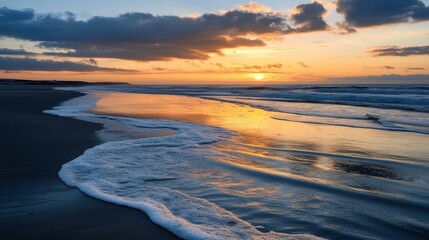 Coastal Serenity: Sunset Reflection on Waves and Sandy Beach at Dusk