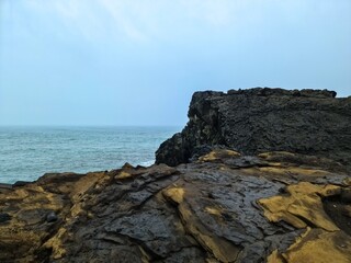 Basalt cliff overlooking the ocean in Iceland