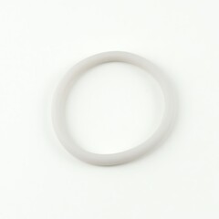 A minimalistic white silicone ring on a clean background, suitable for various designs.