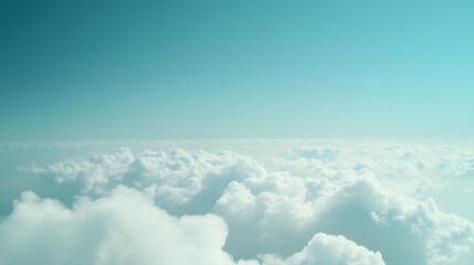 Vast blue sky adorned with delicate clouds, evoking serenity and boundless freedom