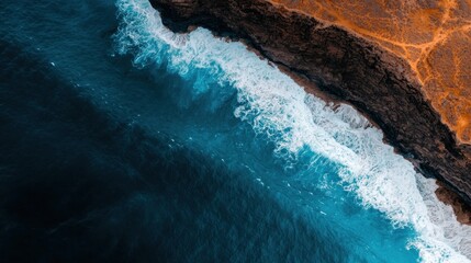 Ocean waves crashing on rocky coastline aerial view natural landscape serene environment coastal beauty