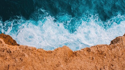 Waves crashing on rocky shore coastal cliffs aerial view natural environment serenity and power