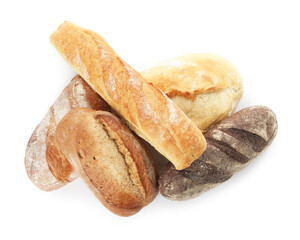 Different loaves of freshly baked bread isolated on white, top view