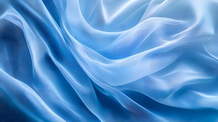 Fototapeta premium Soft blue flowing fabric-like waves forming a calm, smooth abstract texture.