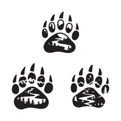 Paw Print with Mountain and River Scene Silhouettes. 