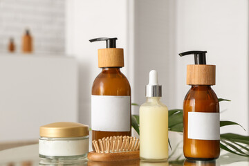 Set with jar and bottles of cosmetic products in bathroom, closeup