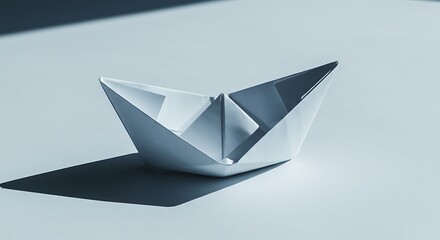 White paper boat on a light background - symbolizes journeys - for greeting cards