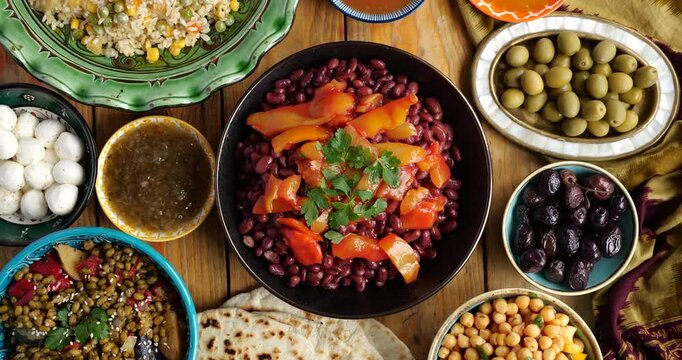 Middle Eastern Bean Salad. Ramadan and Iftar food. Eid dishes on the festive table. Family dinner