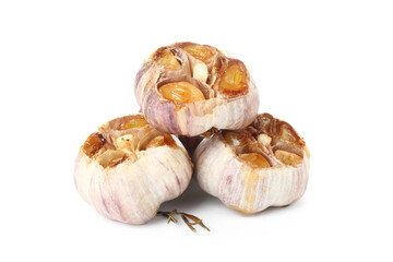 Baked garlic with rosemary on white background