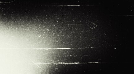 Old film texture with dust scratches, noise and light leaks. Realistic overlay film texture in black-white, dust and grain. Distressed retro movie or photo negative effect of cinema nostalgia