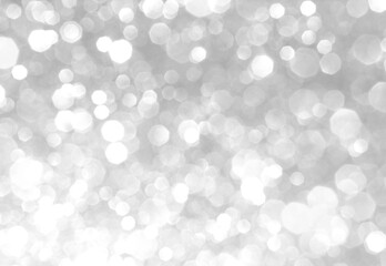 Bokeh background light white blur grey circle backdrop, abstract festive celebrate holidays, sparle silver glitter snow winter season, glamour magic defocused.