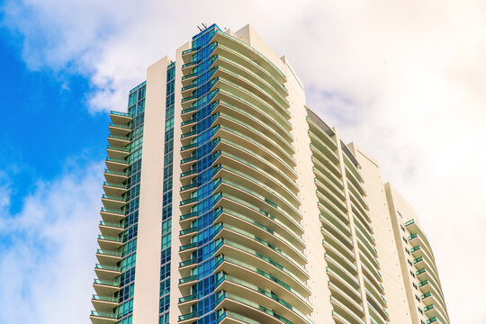 Low angle view of building. Residential building architecture. Architectural exterior detail. Residential house modern exterior. Modern apartment building. Apartment hotel building. Condominium - Powered by Adobe