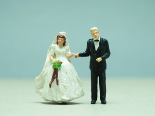 Mini toy of action figure at outdoor with blurred background. Miniature photography concept design....