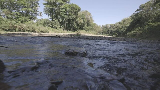 close up of water flowing into the river, hd video, canon eos r c-log 8bits