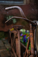Close up detail of an old rusty bicycle handlebars.