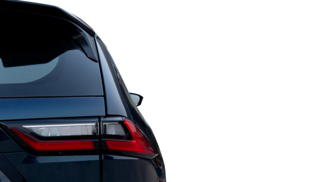 Rear side luxury of dark blue cr close on tail light. Revealing a sleek and classy shape with spoilers. Free space of background isolated of blue screen.