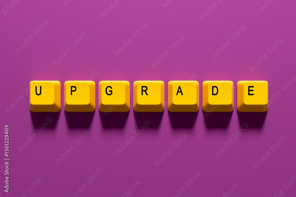 Poster yellow computer keyboard keys spelling upgrade on purple background