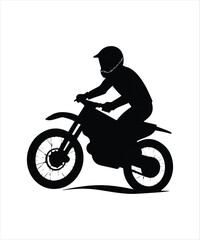 Silhouette of a motocross rider in action.