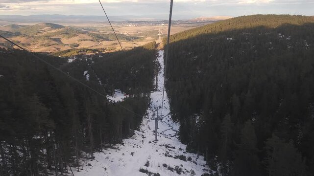 Dolly View in Gondola of Winter Sunset at Peak of Zlatibor Mountains, Tornik