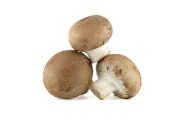 Three brown portobello mushrooms are stacked on a white background, perfect for culinary creations.