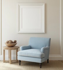 Light blue armchair with wooden side table and blank frame on wall.