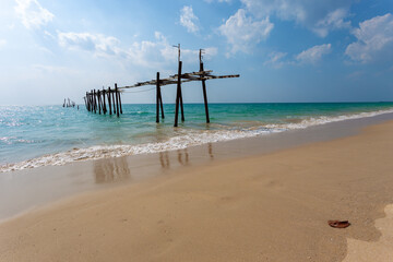 Khao Pilai Beach is an area with a beautiful beach and beautiful views, with an old wooden bridge that is broken and unused as a unique feature, Takua Thung District, Phang Nga