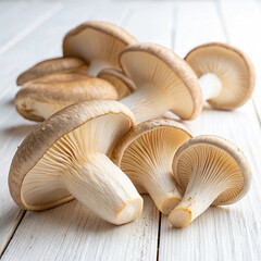 Raw mushrooms on wooden table