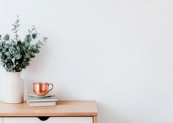 Minimalist Home Decor with Greenery and Copper Mug on Table