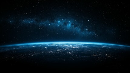 Earth at night, viewed from space, showing city lights and the Milky Way.