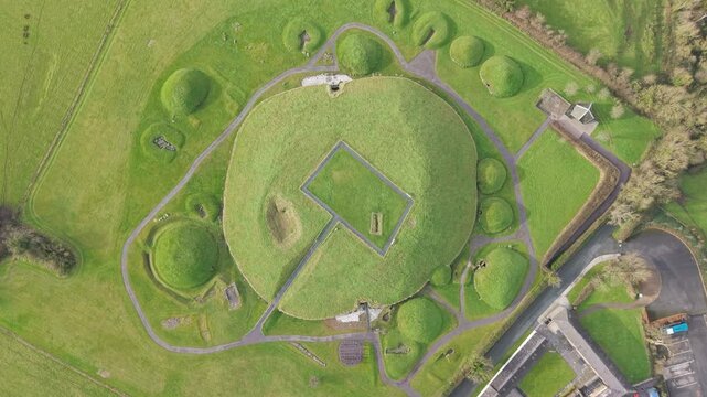 Bird's Eye View Of Knowth - Knowth Passage Tomb In Daytime In County Meath, Ireland. - aerial shot