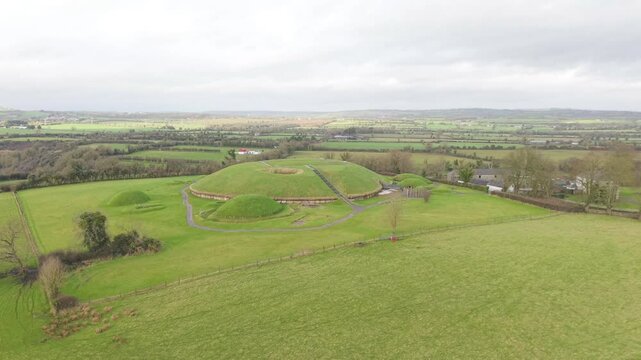 Flying Towards The Knowth, Prehistoric Tomb In County Meath, Ireland. - aerial shot