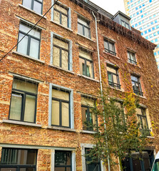  Exterior view of a charming brick building in brussels with modern touches