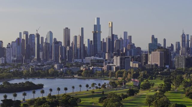 Drone video from above Albert park whilst flying left focusing on the CBD
