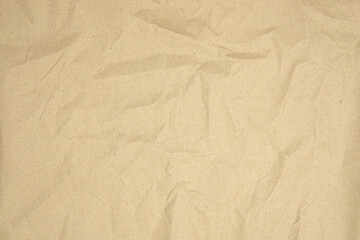 Brown recycled craft paper texture as background. Brown paper texture, Old vintage page or grunge vignette of old newspaper. Hardboard with copy space for text.