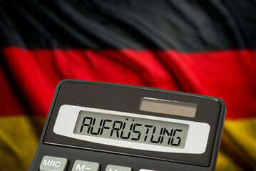 Deutsche Flagge und Taschenrechner für die Kosten der Aufrüstung in Deutschland