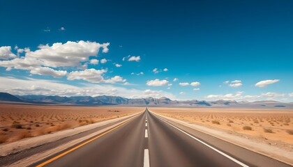 Naklejka premium Desert highway road trip under blue sky travel destination scenic route landscape photography journey asphalt
