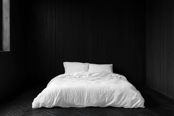 Minimalist bedroom with white bedding against a dark wood wall.