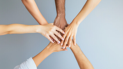 United in Strength: A diverse group of hands coming together, symbolizing unity, teamwork, and collaboration. The shot captures the essence of connection, support, and collective power.