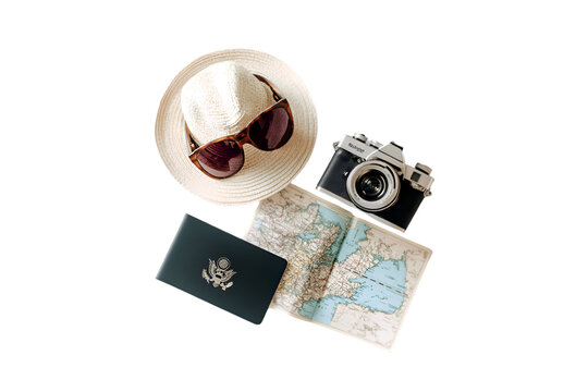 Travel essentials passport map camera sunglasses hat adventure