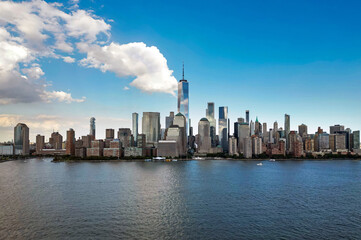 New York City an sky with clouds. NYC cityscape with skyscrapers. Aerial panorama of New York City...