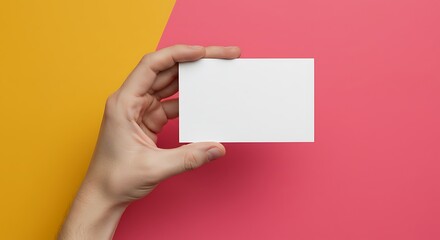 Realistic Hand Holding Blank White Business Card on Vibrant Background