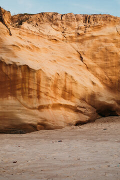 Coastal cliff with eroded sandstone layers in Baleal, Portugal