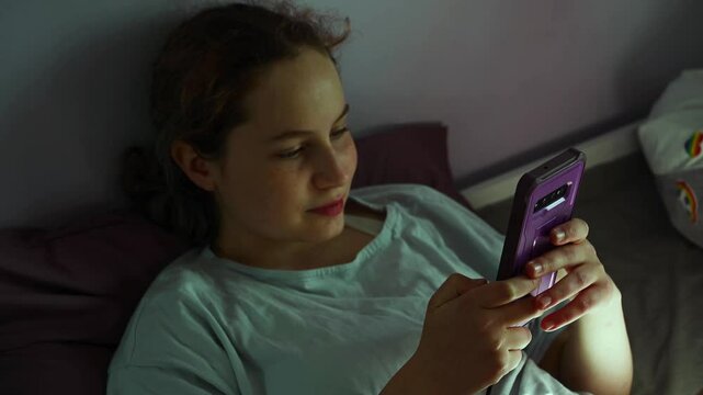young teenage girl using her smartphone