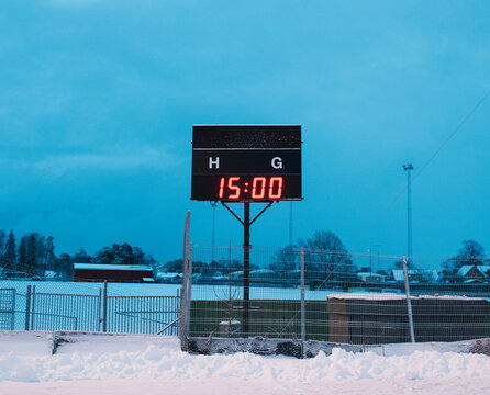giant scoreboard at an outdoor ice rink in Sweden